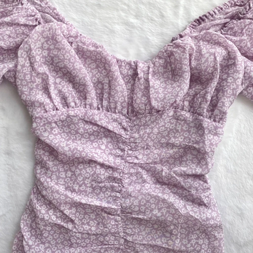 NWT Red Dress Boutique Purple Puff Sleeve Dress w/ Lace Up Open Back - Picture 9 of 16